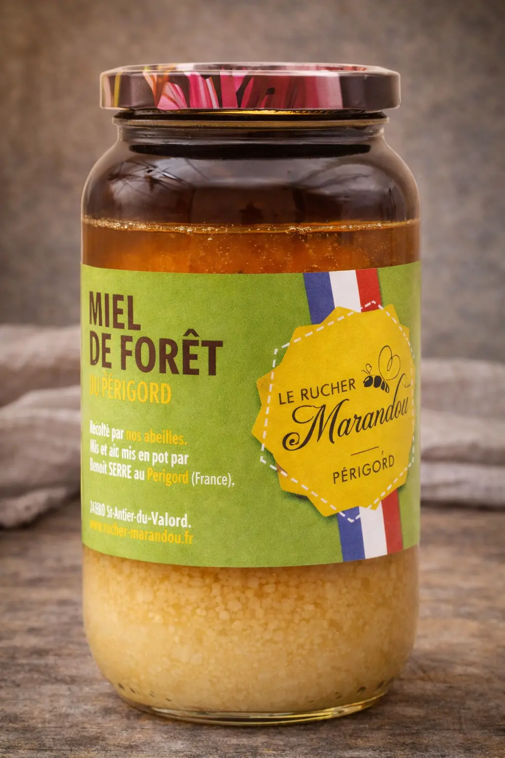 Miel de forêt du Périgord - phase déphasée Pot de miel de forêt du Périgord présentant un phénomène naturel de déphasage avec séparation liquide et cristallisée